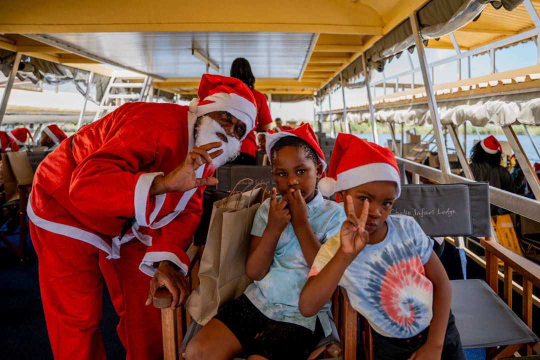 Kids on boat Chobe 2023